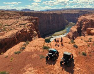 UTVs and people overlooking Horseshoe Bend
